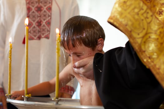 Orthodox baptism of a Belarusian child in a church. photo