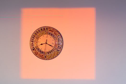 Shadows in the window in the light of the rising sun photo