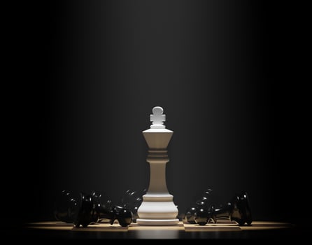 White chess king among lying black pawns on a chessboard. 3D rendering illustration. photo