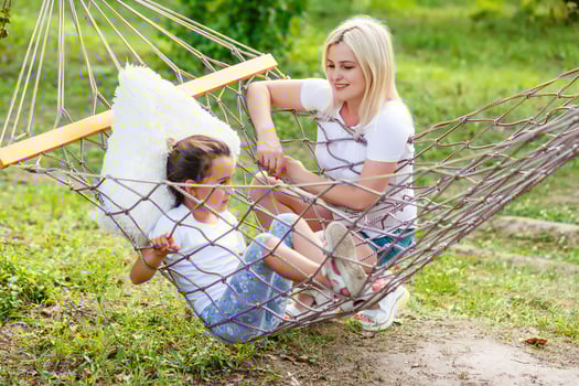 Portrait of family in a hammock photo