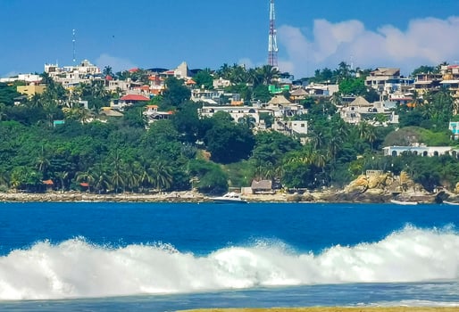 Extremely huge big surfer waves at beach Puerto Escondido Mexico. photo