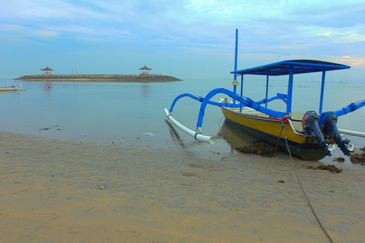 View of a fishing boat on the beach. photo