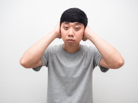 Man sleepless gesture close his ear want to sleep photo