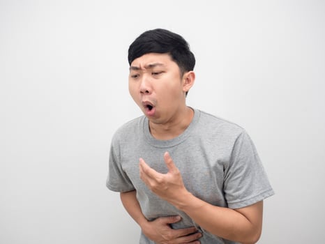 Man feel bad gesture indigestible and puke photo