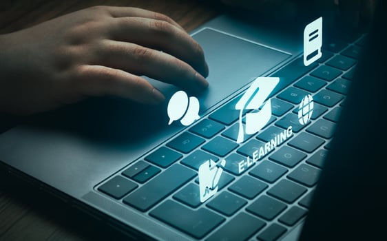 Woman using laptop for distance education. E-Learning icons. Online study. Webinar, courses, seminar and conference. photo