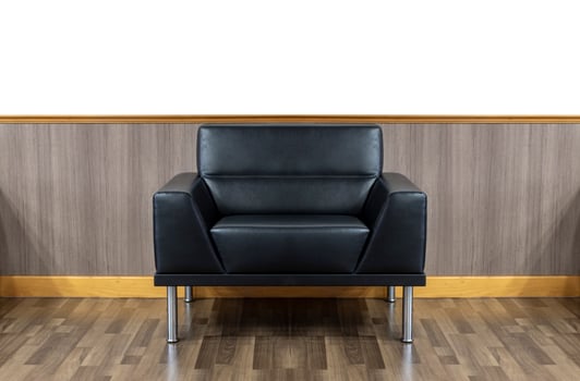 Black leather sofa in the living room photo