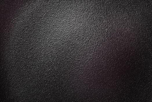 Empty beautiful black ceramic plate on a dark concrete background photo