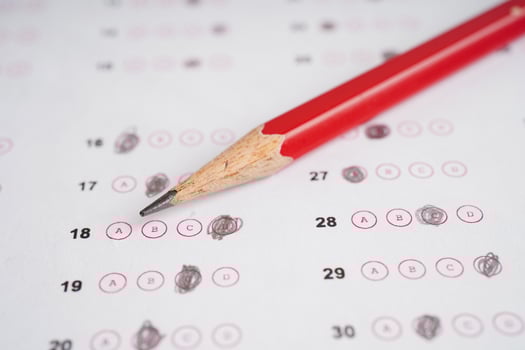 Answer sheets with pencil drawing fill to select choice, education concept. photo