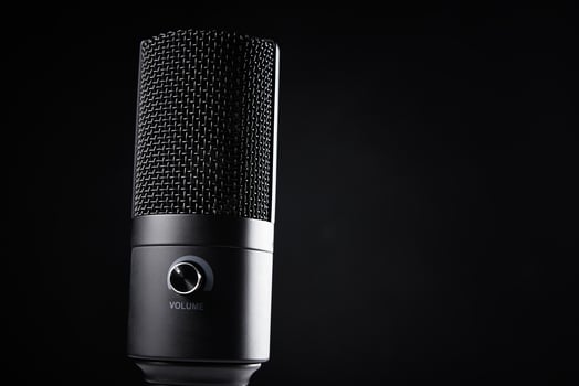 Studio microphone on dark background photo