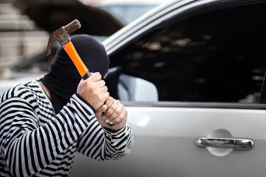Car thief hijack and steal or rob money in car and car breaking door window without car alarm illegal and violence criminal job photo