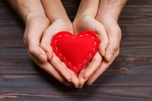 He vs she together forever. Love story, beautiful hand hold holding red heart photo
