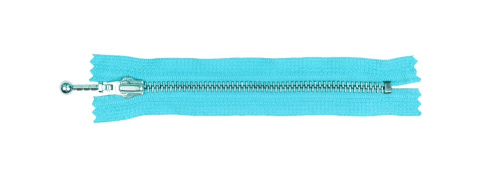 blue zipper isolated on white. top view photo