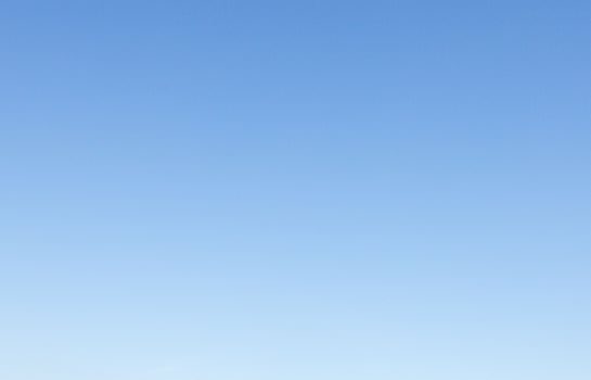 Image of a clear and cloudless sky can be used as background photo