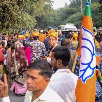 Delhi, India, December 02 2022 -Bharatiya Janata Party BJP supporter during mega road show in support of BJP candidate Pankaj Luthara to file nomination papers ahead of MCD local body Elections 2022 photo