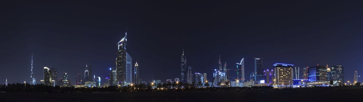 Panorama of Dubai by night photo