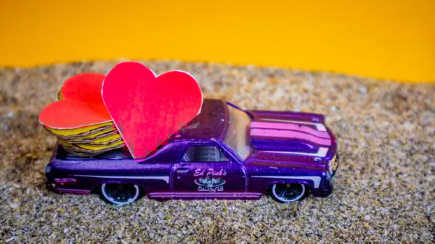 Minahasa, Indonesia  December 2022, the toy cars transporting hearts photo