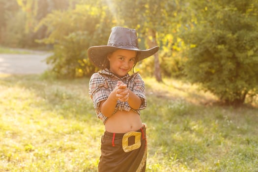 beautiful little girl in cowboy hat photo