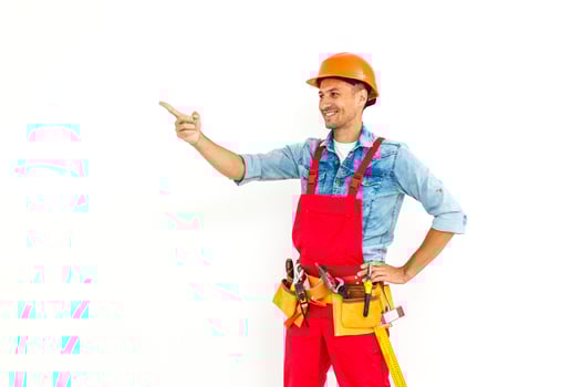 Serious construction worker in yellow helmet and orange looking up. Full length studio shot isolated on white. photo