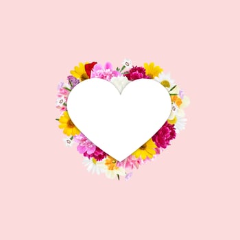 Heart with flowers on a pink background. Valentine's Day. Mothers Day. photo