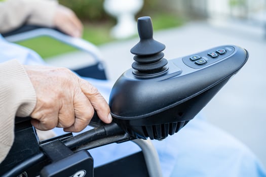 Asian senior or elderly old lady woman patient on electric wheelchair with remote control at nursing hospital ward, healthy strong medical concept photo