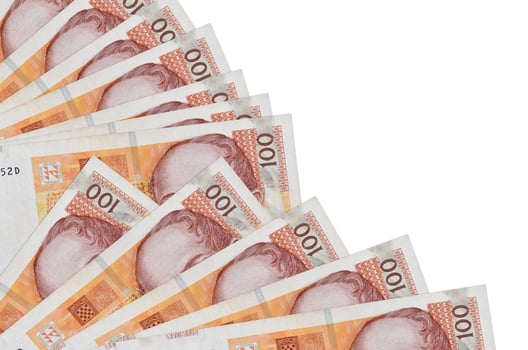 100 Croatian kuna bills lies isolated on white background with copy space stacked in fan close up photo