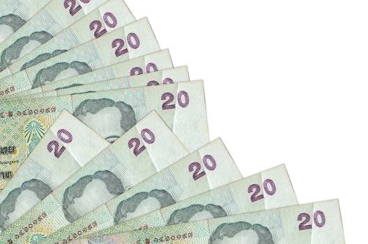 20 Thai Baht bills lies isolated on white background with copy space stacked in fan close up photo