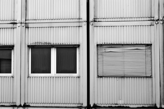 old industrial building facade with windows photo