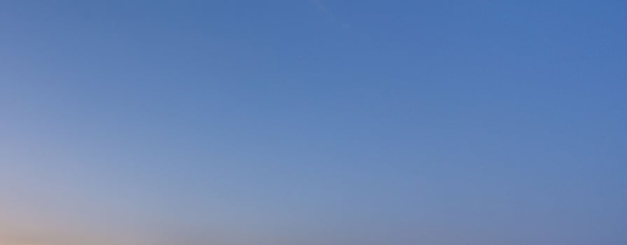 Image of a clear and cloudless sky can be used as background photo