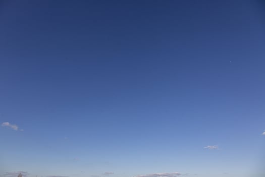 Image of a clear and cloudless sky can be used as background photo