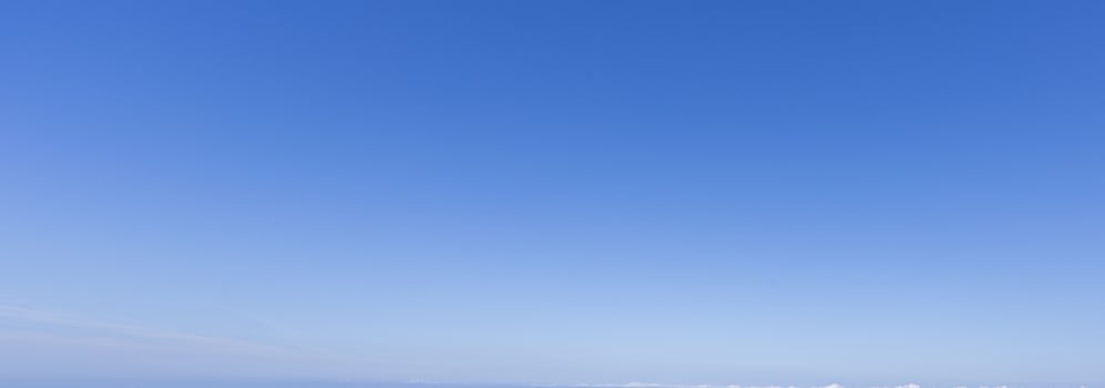 Image of a clear and cloudless sky can be used as background photo