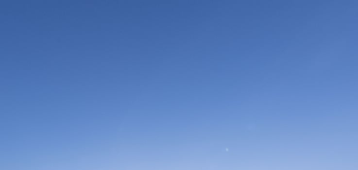 Image of a clear and cloudless sky can be used as background photo