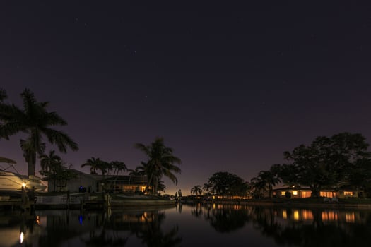 Panoramic picture of Cape Coral water channels at night in spring photo