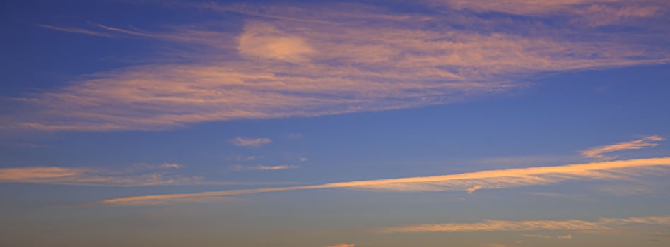 Dramatic colorful sky with afterglow and illuminated clouds photo