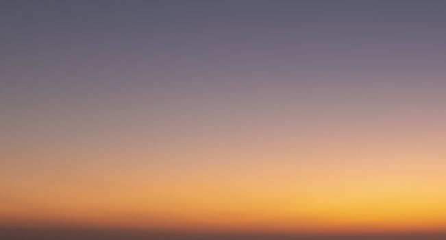 Dramatic colorful sky with afterglow and illuminated clouds photo