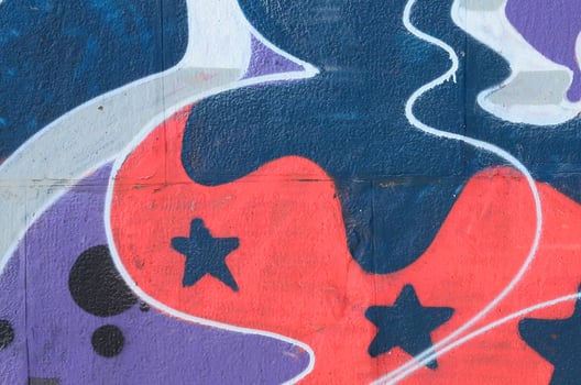 Fragment of graffiti drawings. The old wall decorated with paint stains in the style of street art culture. Colored background texture in cold tones photo