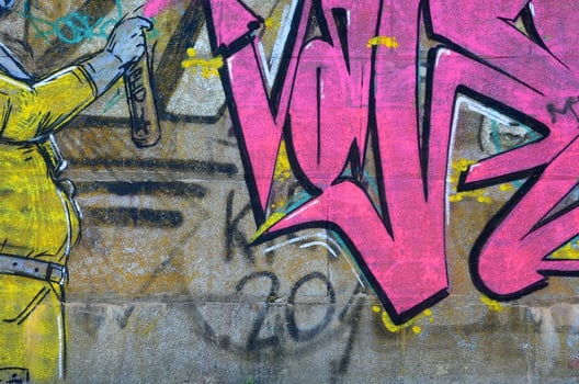 Fragment of graffiti drawings. The old wall decorated with paint stains in the style of street art culture. Scary scuba diver photo