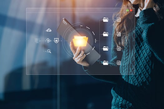 Document management system concept, Businessman signs electronic documents on digital documents, searching and managing files online document database, for efficient archiving and company data photo
