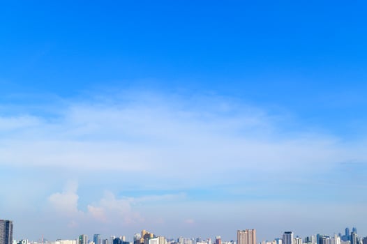 blue sky in summer day over the city photo