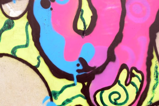 Background image with a graffiti pattern, which is applied to a concrete wall with aerosol paints photo