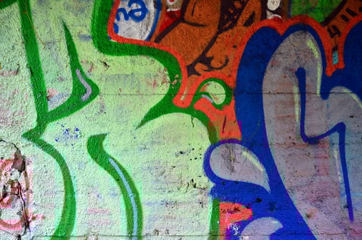 Art under ground. Beautiful street art graffiti style. The wall is decorated with abstract drawings house paint. Modern iconic urban culture of street youth. Abstract stylish picture on wall photo