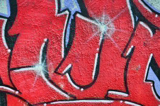 Art under ground. Beautiful street art graffiti style. The wall is decorated with abstract drawings house paint. Modern iconic urban culture of street youth. Abstract stylish picture on wall photo