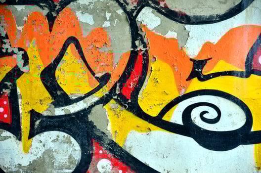 Art under ground. Beautiful street art graffiti style. The wall is decorated with abstract drawings house paint. Modern iconic urban culture of street youth. Abstract stylish picture on wall photo