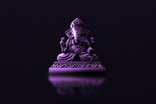 Selective focus on statue of Lord Ganesha, Ganesha Festival. Hindu religion and Indian celebration of Diwali festival concept on dark, red, yellow background. photo
