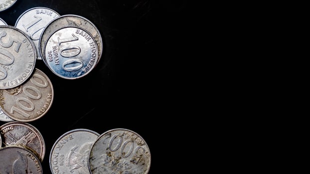 pile of rupiah coins as background photo
