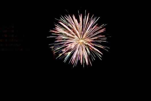 Celebratory big circle gold fireworks on a black background. Preparation for further work. Screen overlay. Bright and colorful illustration for design. photo