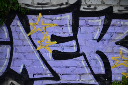 Detailed image of color graffiti drawing. Background street art picture photo