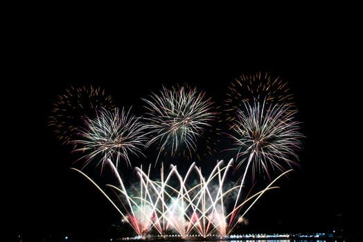 Abstract colored firework new year festival night sky background. photo