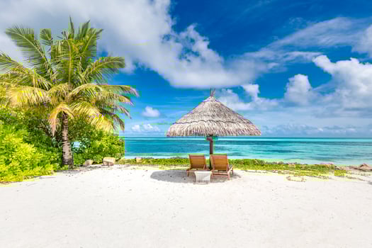 Beautiful summer vacation landscape. Exotic beach, relax tourism travel banner. Chairs or loungers on perfect beach. Tropical scenery, sea sand sky concept. Inspirational, recreational beach view photo