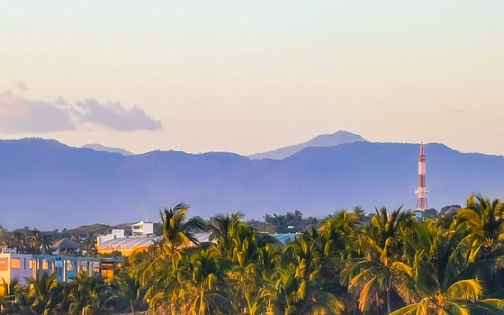 Mountains and cliffs by the sea for sunset in Mexico. photo