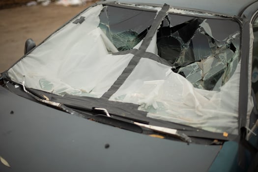 Broken car glass. Car after accident. Destroyed body of transport. Broken car. photo